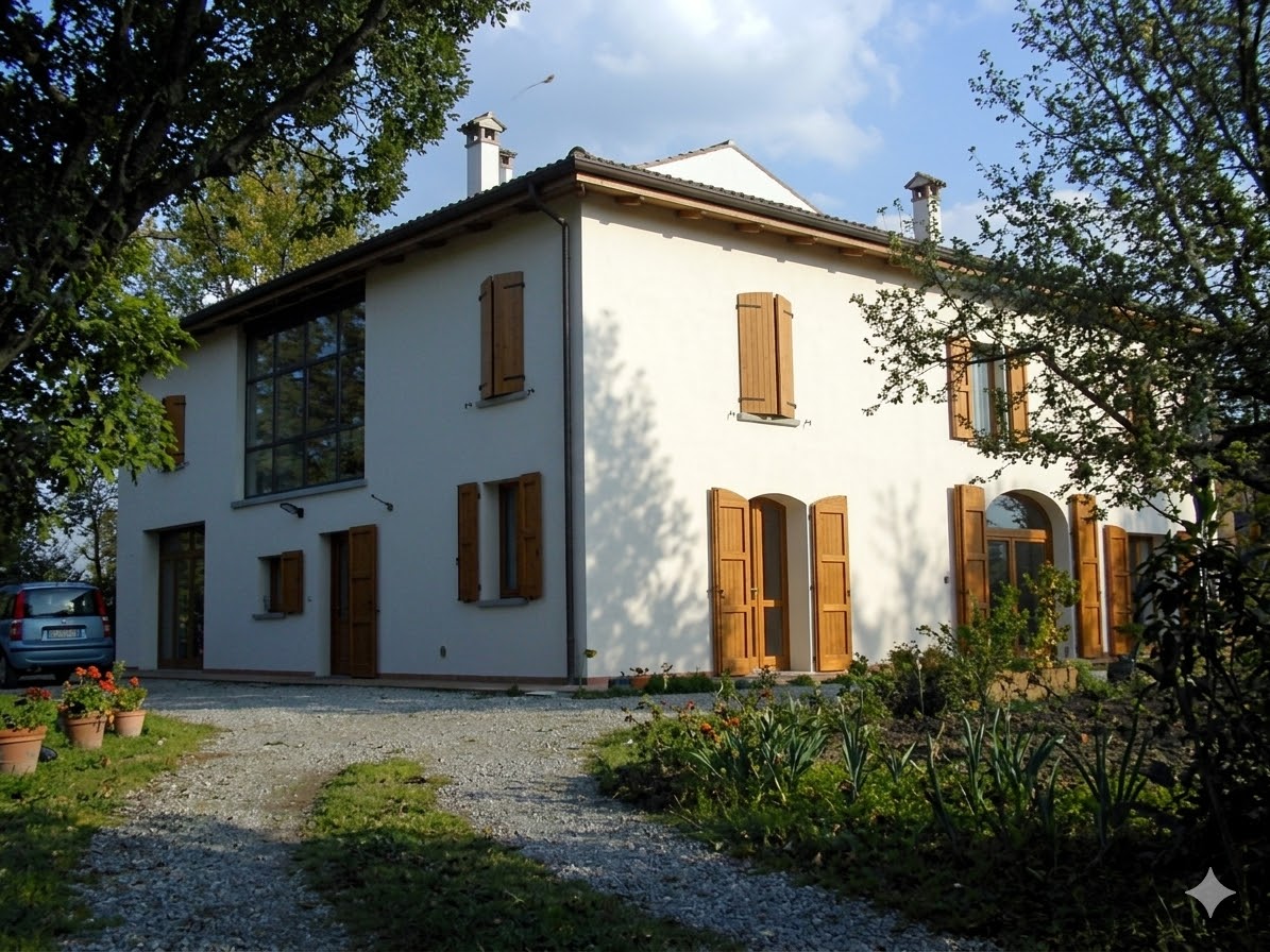 Facciata della casa colonica Le Rondini con giardino